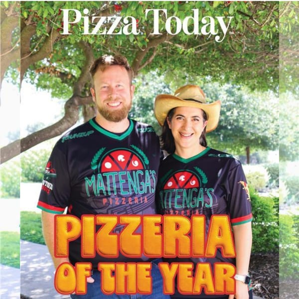Two smiling people in Mattenga's Pizzeria shirts, celebrating "Pizzeria of the Year" under a tree.