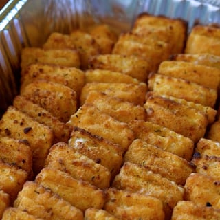Four-Cheese Breaded Ravioli served with Marinara