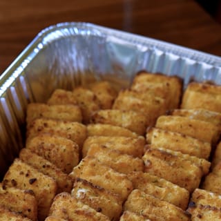 Four-Cheese Breaded Ravioli served with Marinara